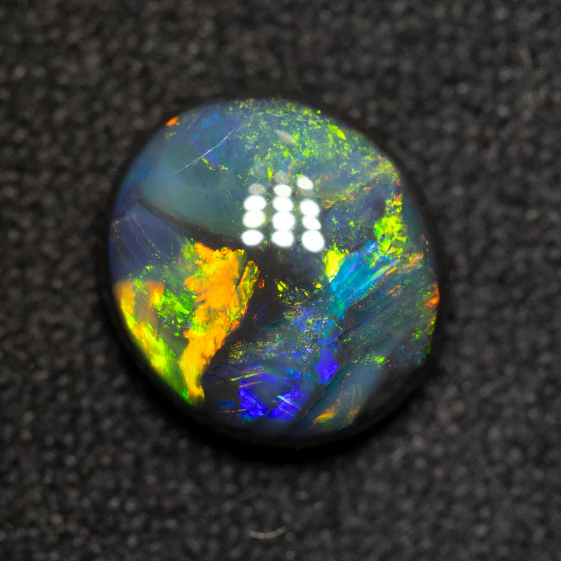 1.54 ct black opal 8.5x7.6x3.7mm - Image 2