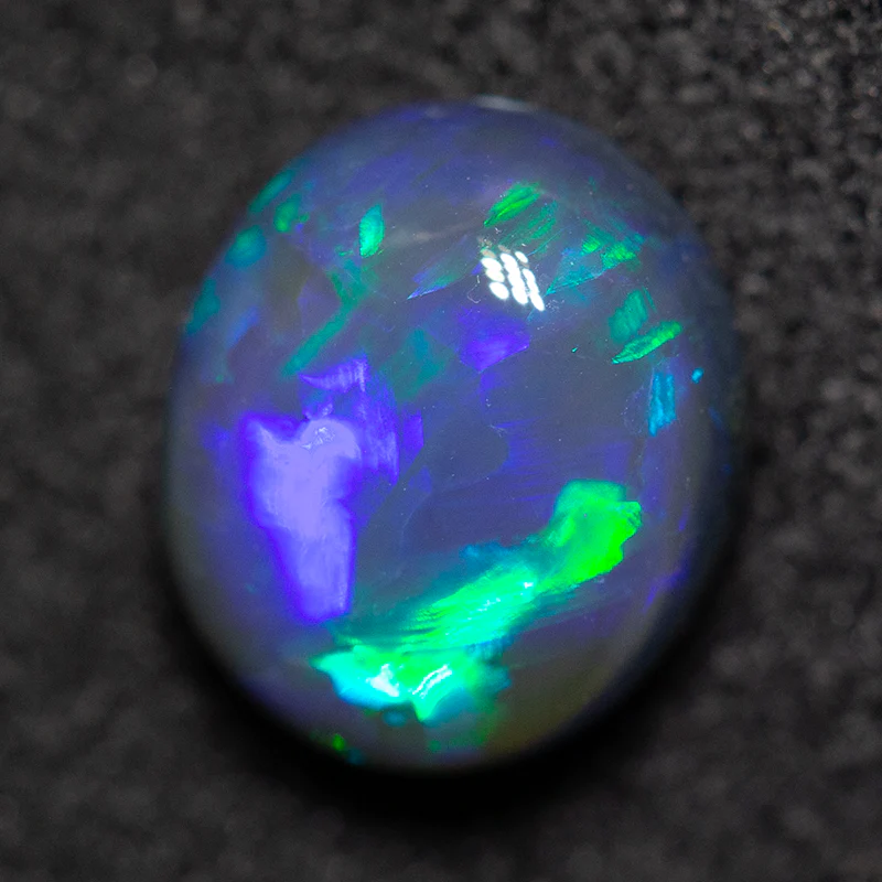 1.54 ct black opal 8x6.9x4.2mm - Image 2