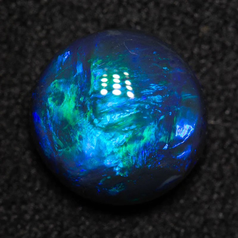 1.57 ct black opal 7.8x7.7x4mm - Image 3