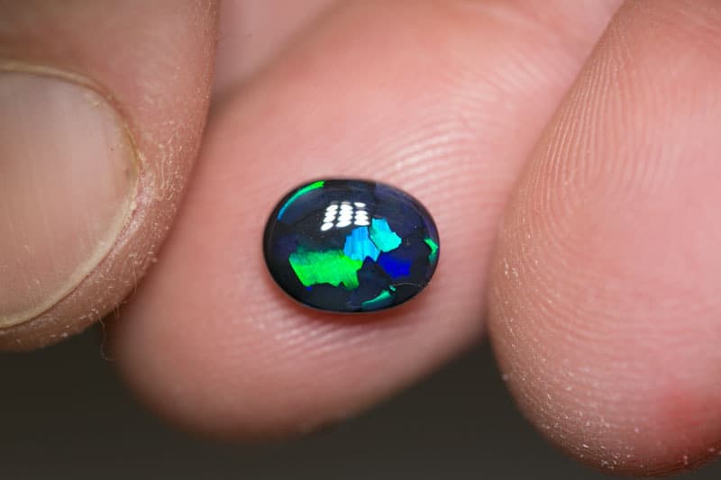 1.57 ct black opal 8.5x7x4mm - Image 2