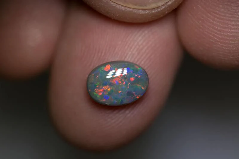 1.60 ct dark opal 9x7x3.5mm - Image 4