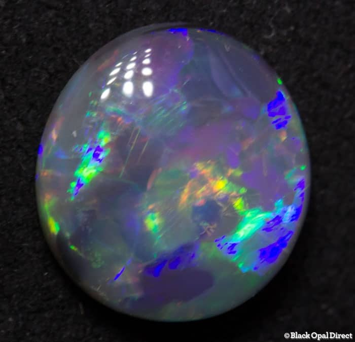 1.62 ct double sided black opal 9x8.5x3mm - Image 4