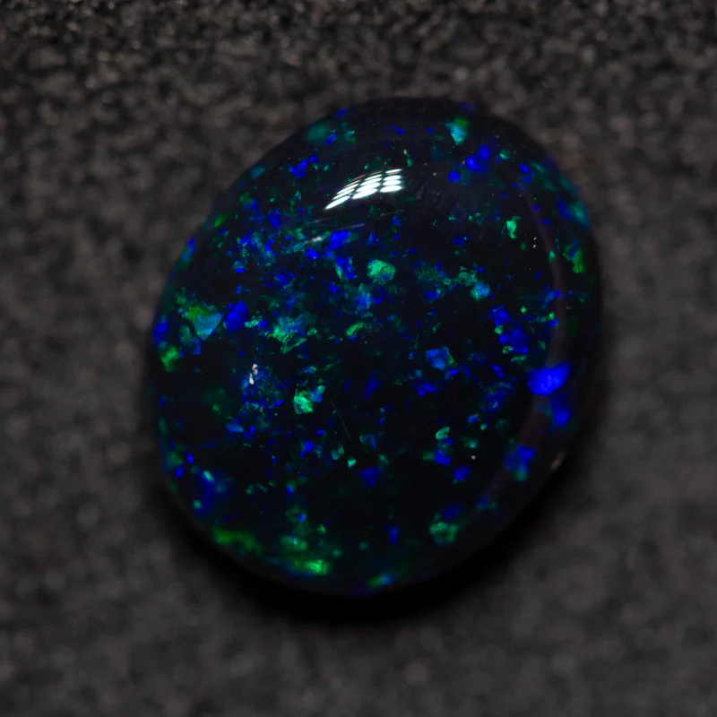 1.64 ct black opal 8.8x7.3x4.1mm - Image 3