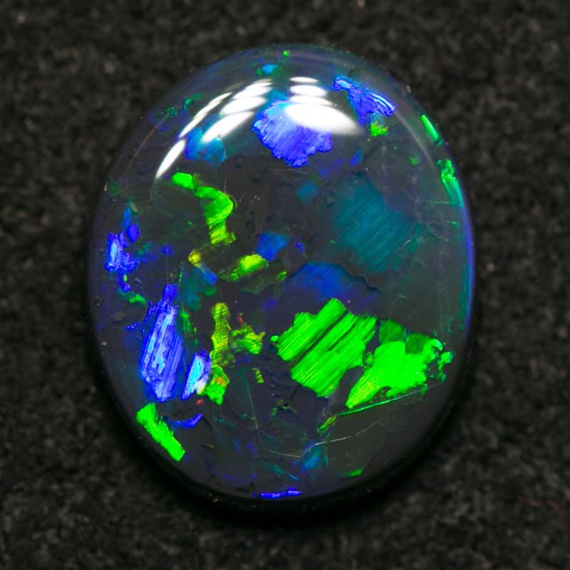 1.65 ct gem black opal 10x8.5x3mm - Image 2