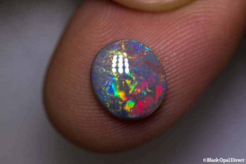 1.67 ct semi black opal 10x9x2.5mm DAVE C - Image 2