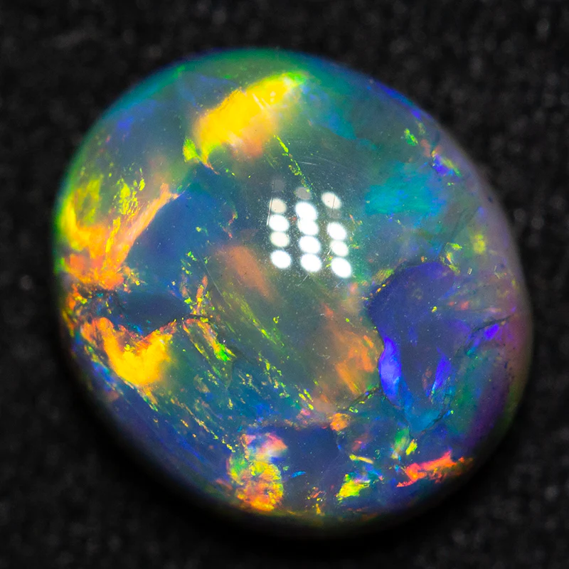 1.70 ct black opal gem 9x8x4mm - Image 2