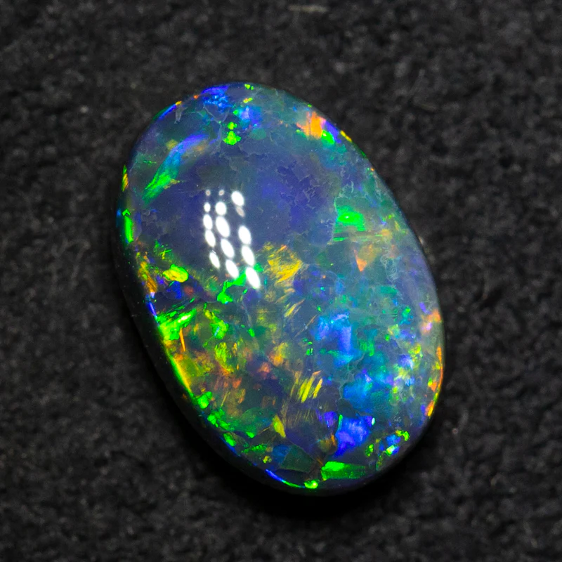 1.71 ct black opal 6.4x9.4x4.4mm - Image 2