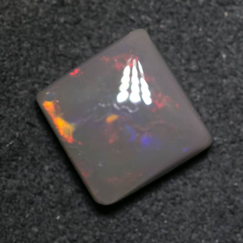 1.72 ct black opal cushion 7x7x3mm - Image 2