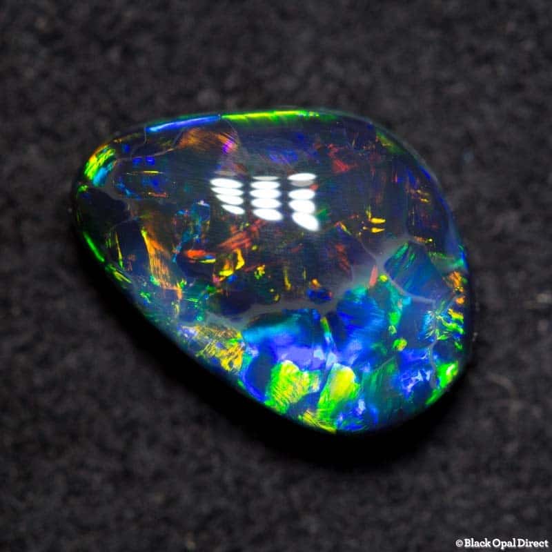 1.73 ct baroque black opal 9.5x6.5x4mm - Image 4
