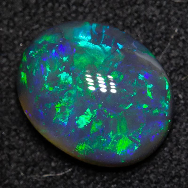 1.76 ct black opal 9.5x7.5x3.5mm - Image 2