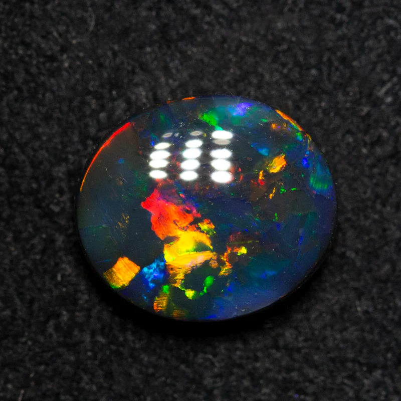 1.76 ct gem black opal 8.9x7.8x3.7mm - Image 4
