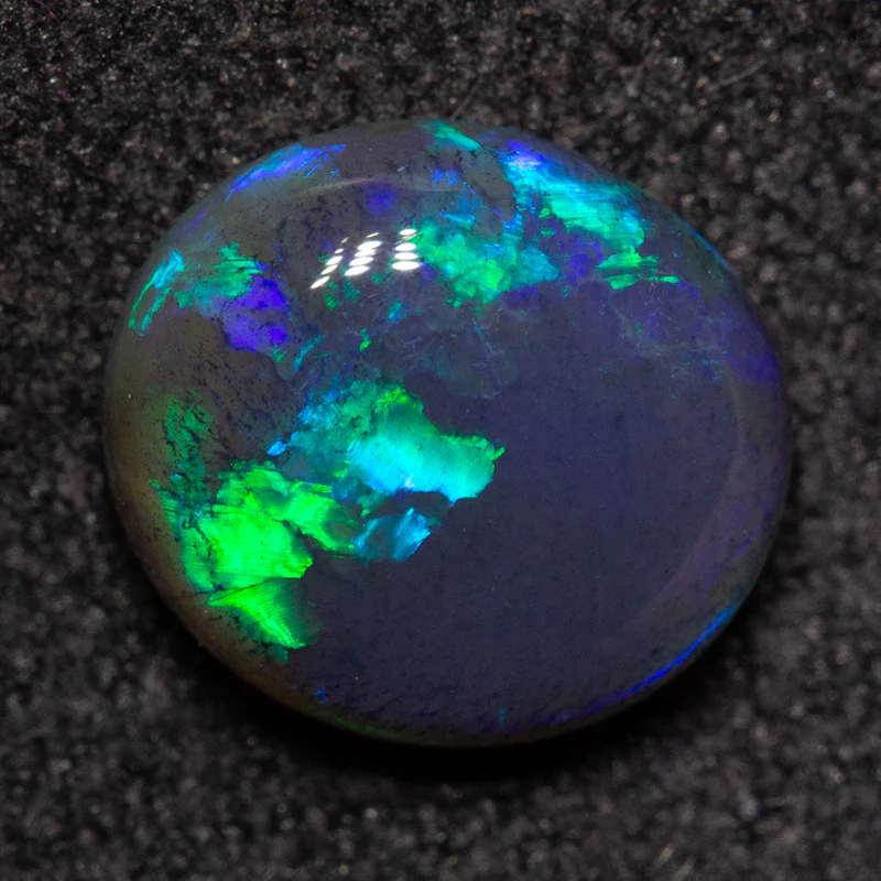 1.60 ct black opal 8.4x7.6x3.9mm - Image 2