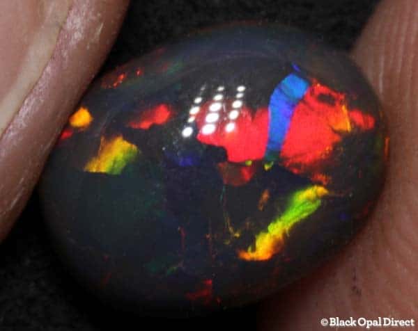 1.84 ct high domed gem black opal 9x7x5mm - Image 3
