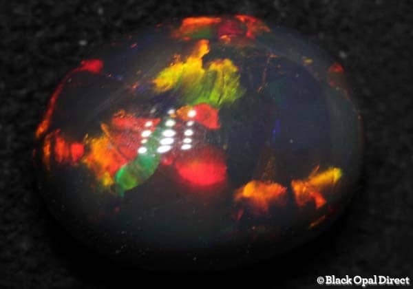 1.84 ct high domed gem black opal 9x7x5mm - Image 4