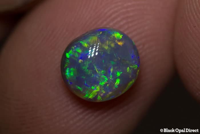 1.86 ct semi black crystal opal 9x8x5mm - Image 5