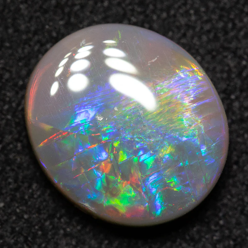 1.94 ct dark opal 9.3x8.5x3.4mm - Image 3