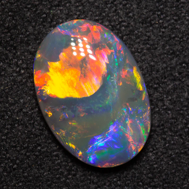 1.95 ct black opal 11.8x8.3x3mm - Image 4
