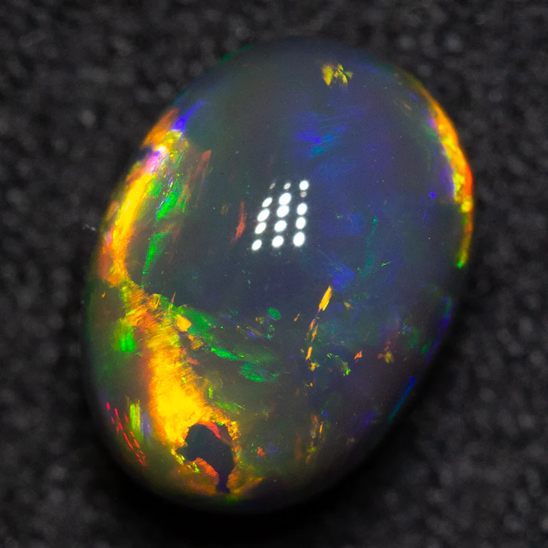 1.95 ct black opal 8.5x6.3x5.7mm - Image 2