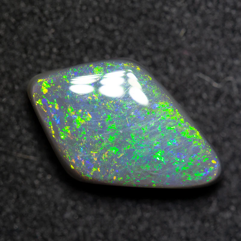 1.95 ct double sided black opal 12.1x7.4x3.9mm - Image 2