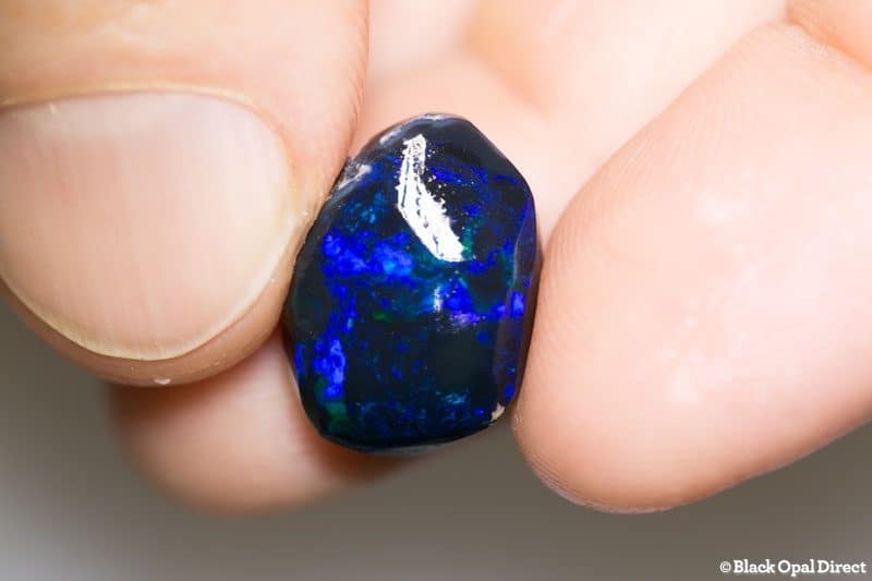 11.27 ct roughly rubbed black opal piece 17mm across Bill - Image 2