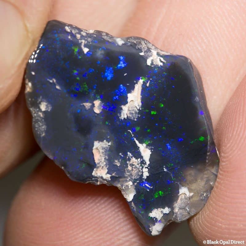 13.92ct polish black raw opal 28x19x4mm - Image 2