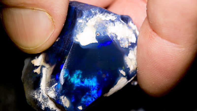 141ct roughly rubbed opal piece 35mm across - Image 2