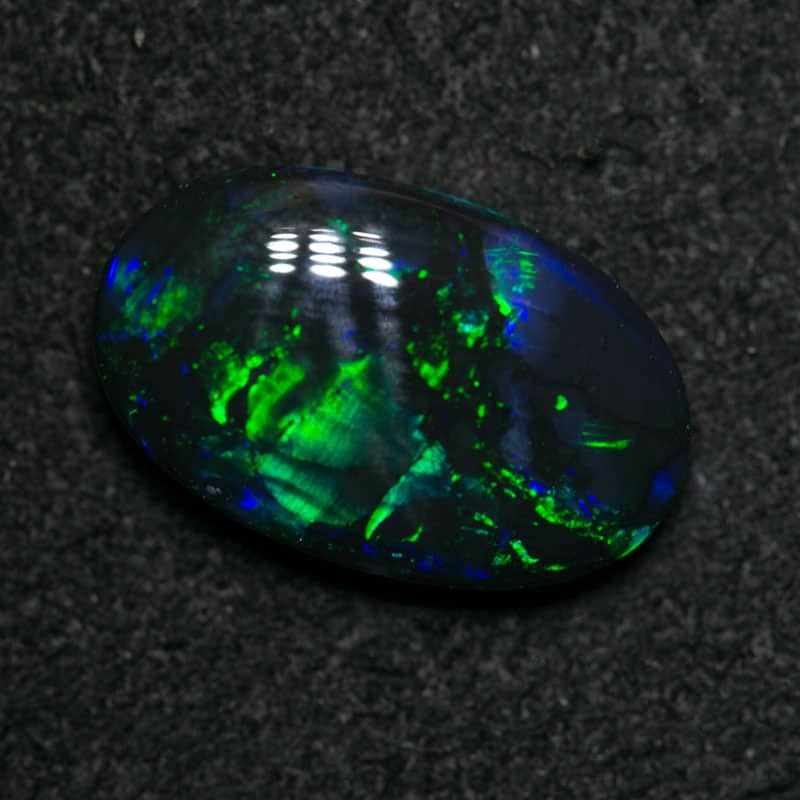 2.02 ct black opal 12x7x3mm - Image 3