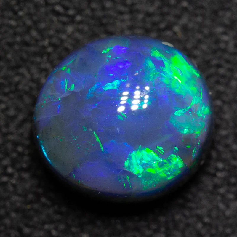 2.03 ct black opal 7.6x7x5.8mm - Image 2