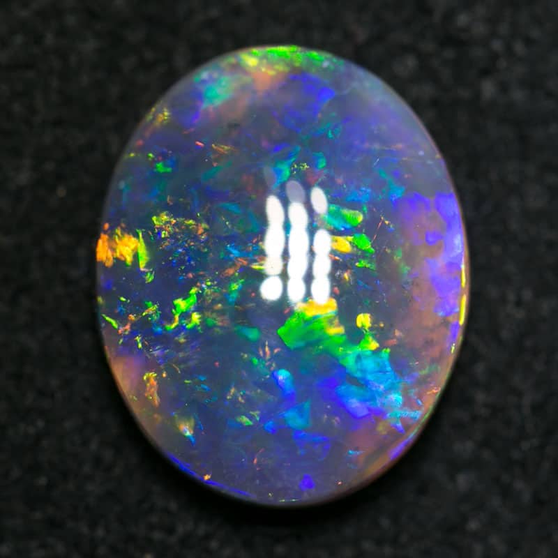 2.06 ct black opal 10.5x9x3.5mm - Image 2