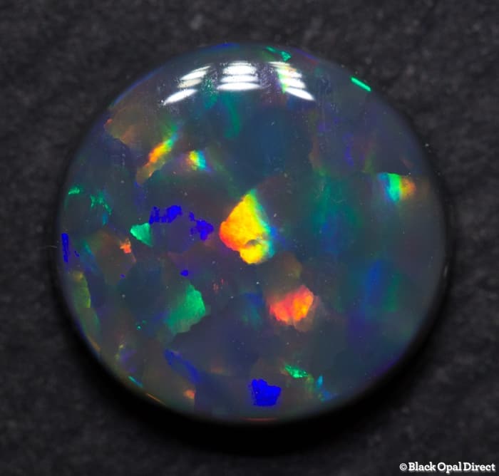 2.08 ct Harlequin black opal 9.5mm round x3mm - Image 2