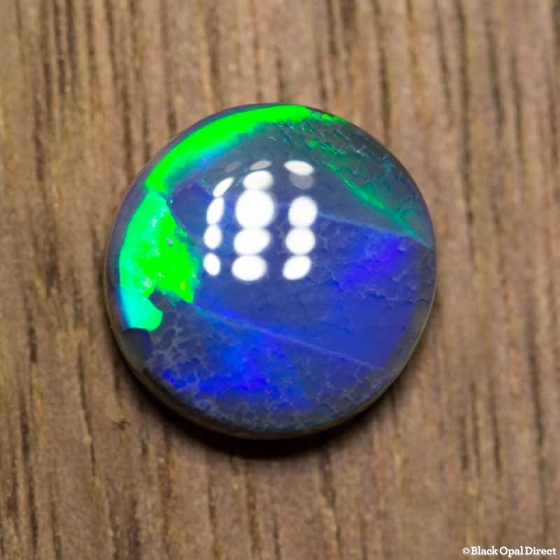 2.18 ct black opal 9mm round x 4mm - Image 2