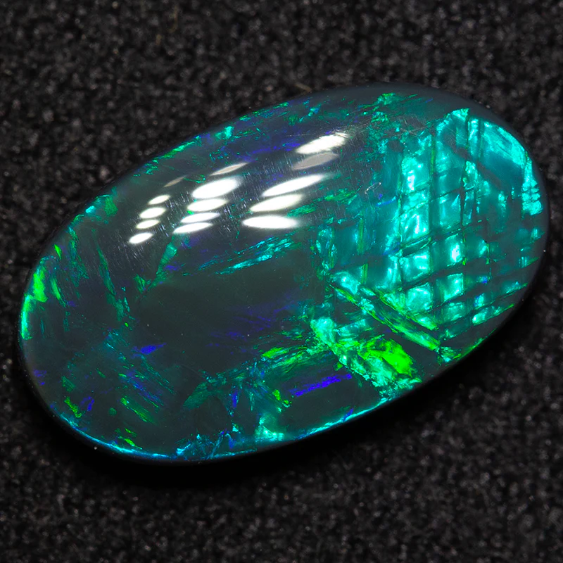 2.24 ct black opal 12.4x7.4x3.6mm - Image 2