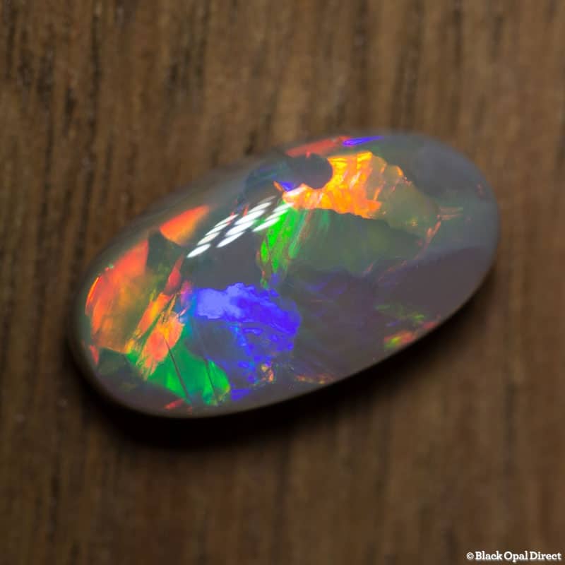 2.31 ct semi black opal 12x6.5x4mm - Image 2