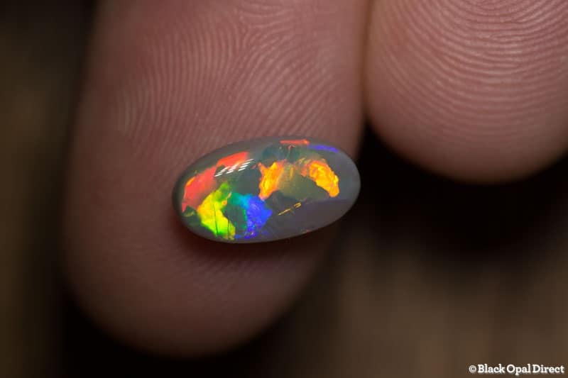 2.31 ct semi black opal 12x6.5x4mm - Image 3