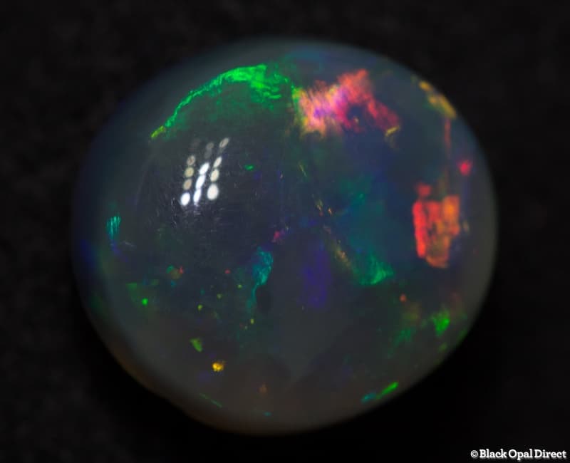 2.36ct semi black opal 9x8x5mm - Image 2