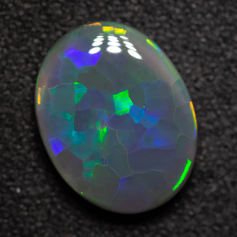 2.39 ct black opal 10.8x8.6x3.8mm - Image 4