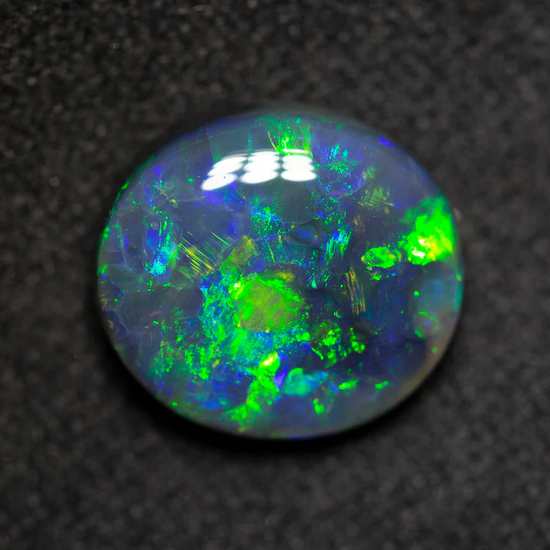 2.42 ct black opal 10x9x4.3mm - Image 2