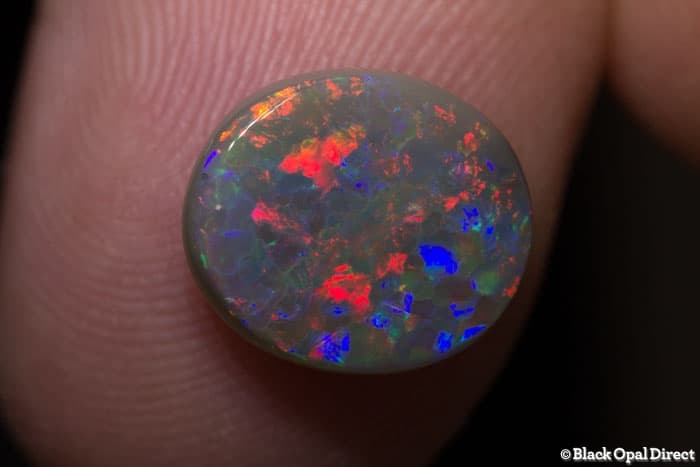 2.44 ct semi black opal 11.5x10x3mm - Image 2