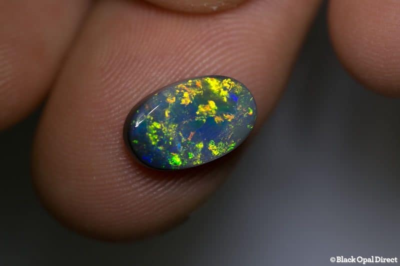 2.52 ct black opal 12x7.5x3mm - Image 2