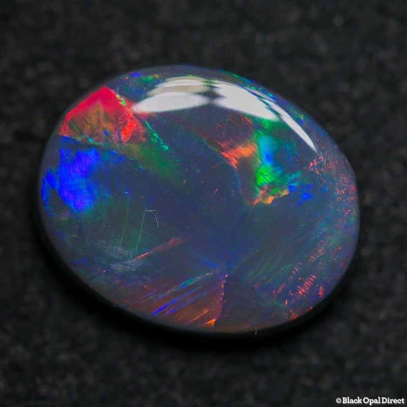 2.59 ct black opal gem 11.5x9x3mm - Image 4