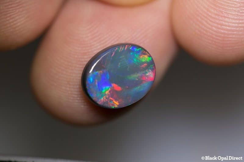 2.59 ct black opal gem 11.5x9x3mm - Image 5