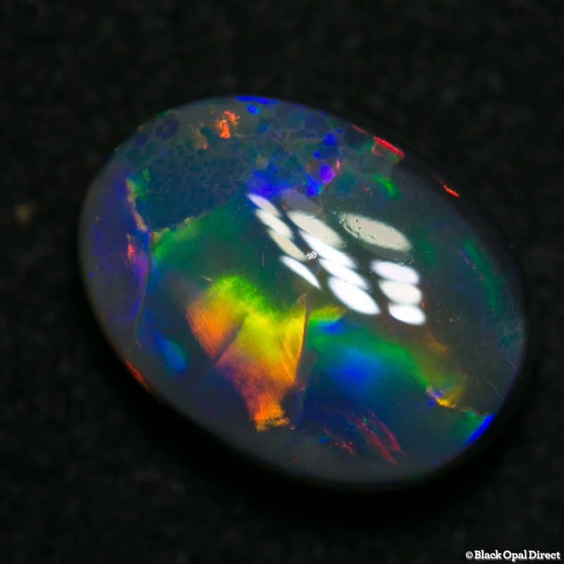 2.59 ct black opal gem 11x8x4mm - Image 5