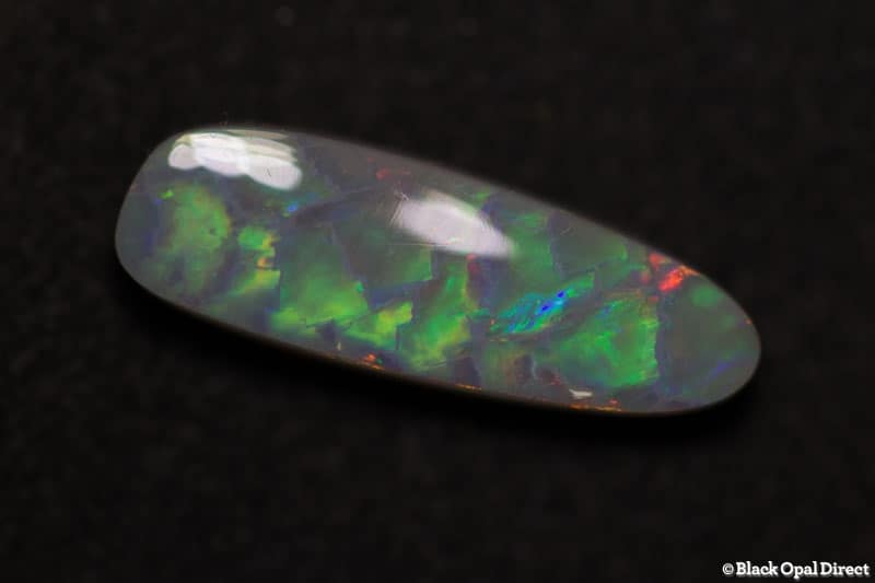 2.60 ct baroque semi black opal 17x6x3.5mm - Image 2