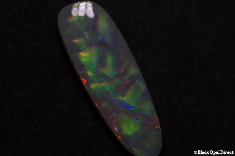 2.60 ct baroque semi black opal 17x6x3.5mm - Image 4