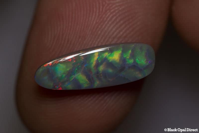 2.60 ct baroque semi black opal 17x6x3.5mm - Image 5