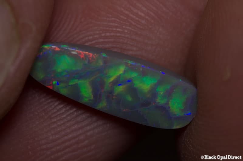 2.60 ct baroque semi black opal 17x6x3.5mm - Image 6