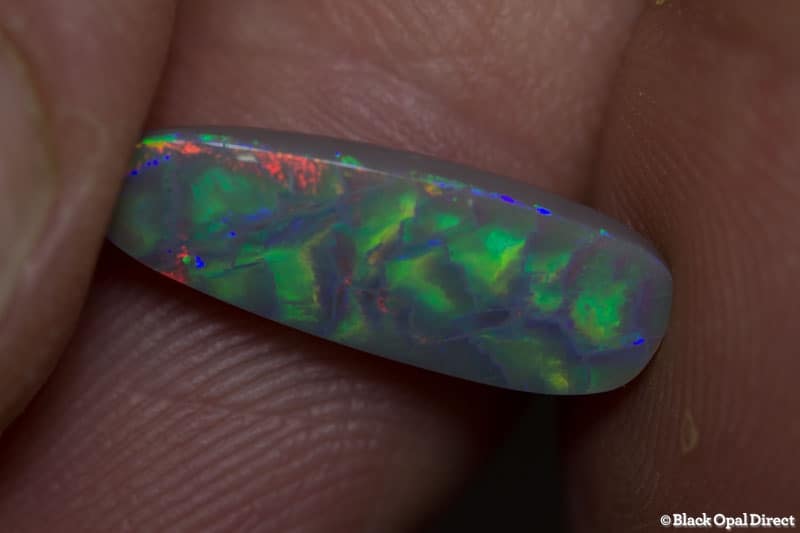 2.60 ct baroque semi black opal 17x6x3.5mm - Image 7