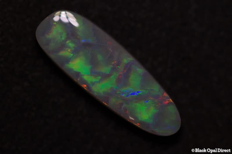 2.60 ct baroque semi black opal 17x6x3.5mm - Image 9