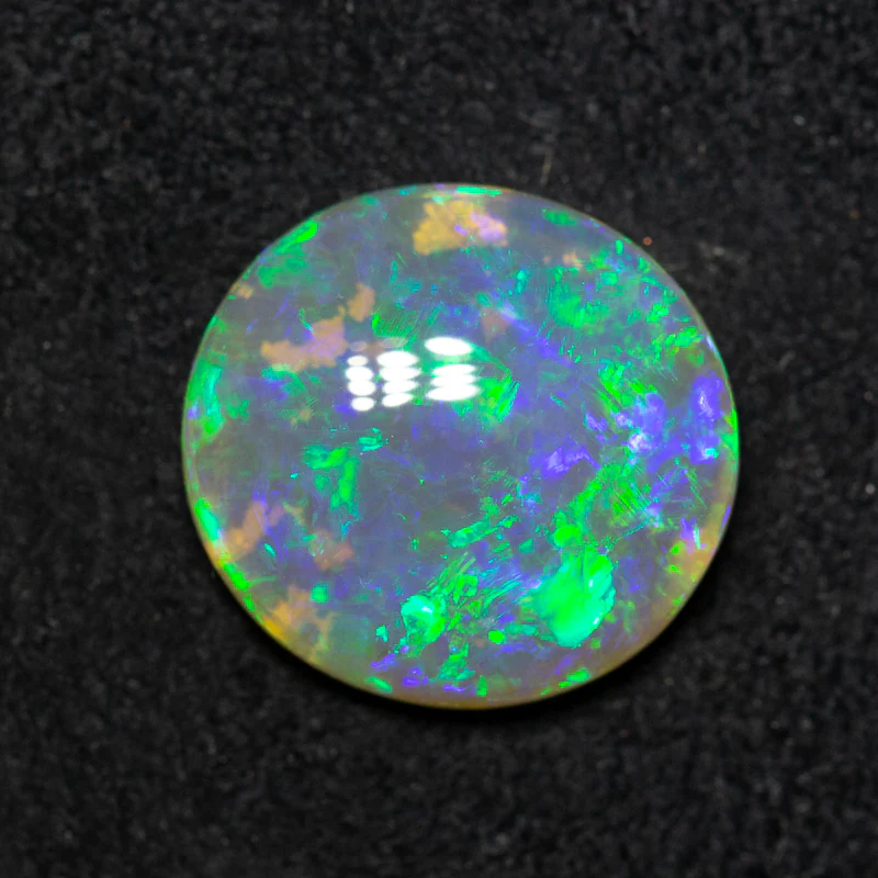 2.60 ct crystal opal 11.3x10.6x3.4mm - Image 2