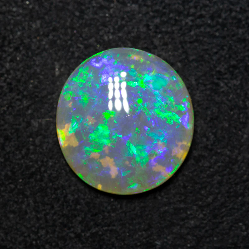 2.60 ct crystal opal 11.3x10.6x3.4mm - Image 3